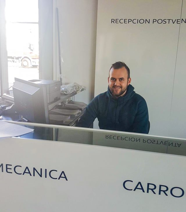One of the automotive students during his internship at the office