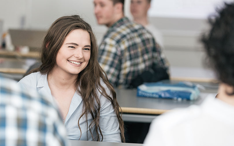 Girl smiling during the talk with others