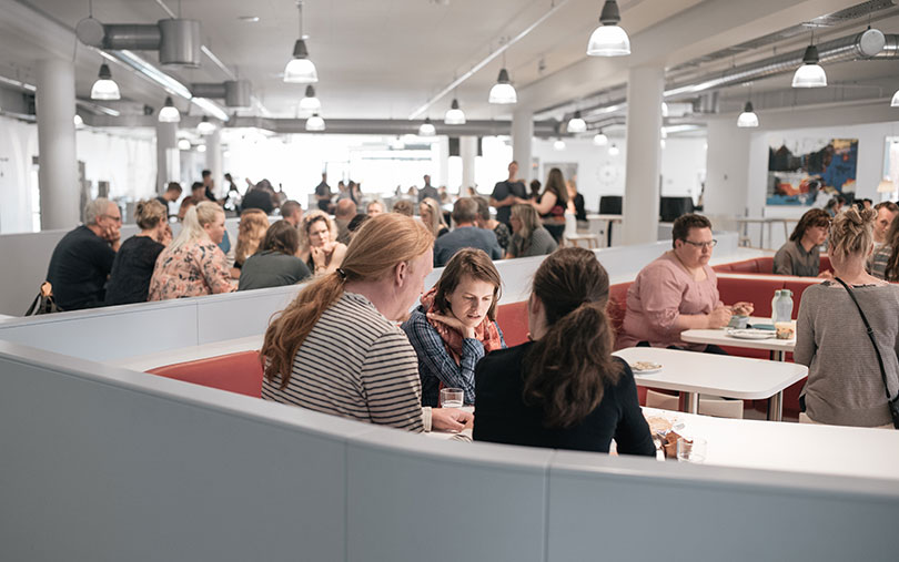 Students sitting on the lunch zone in school