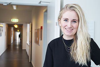 Blond student smiling