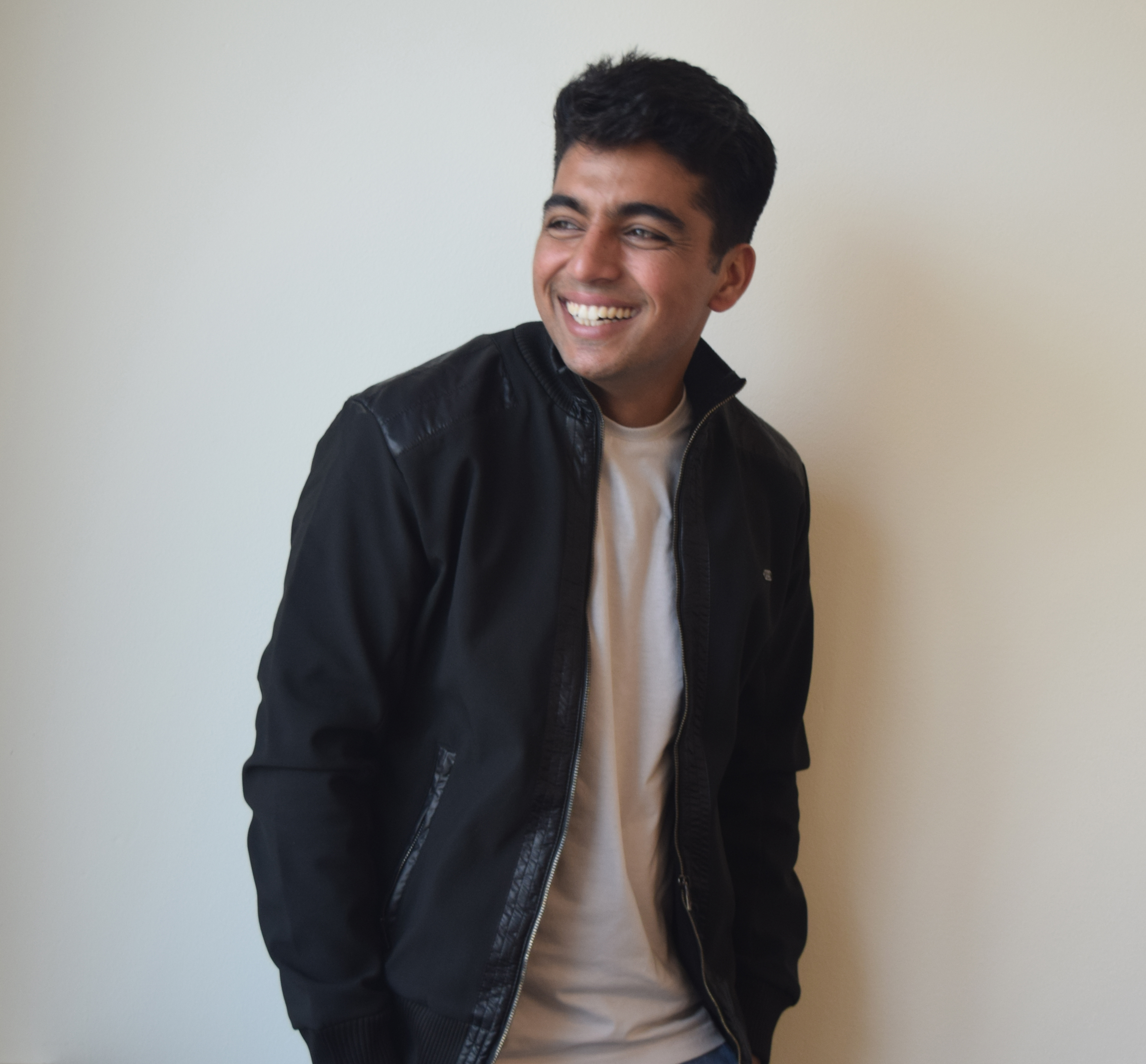 Young student smiling with the white background