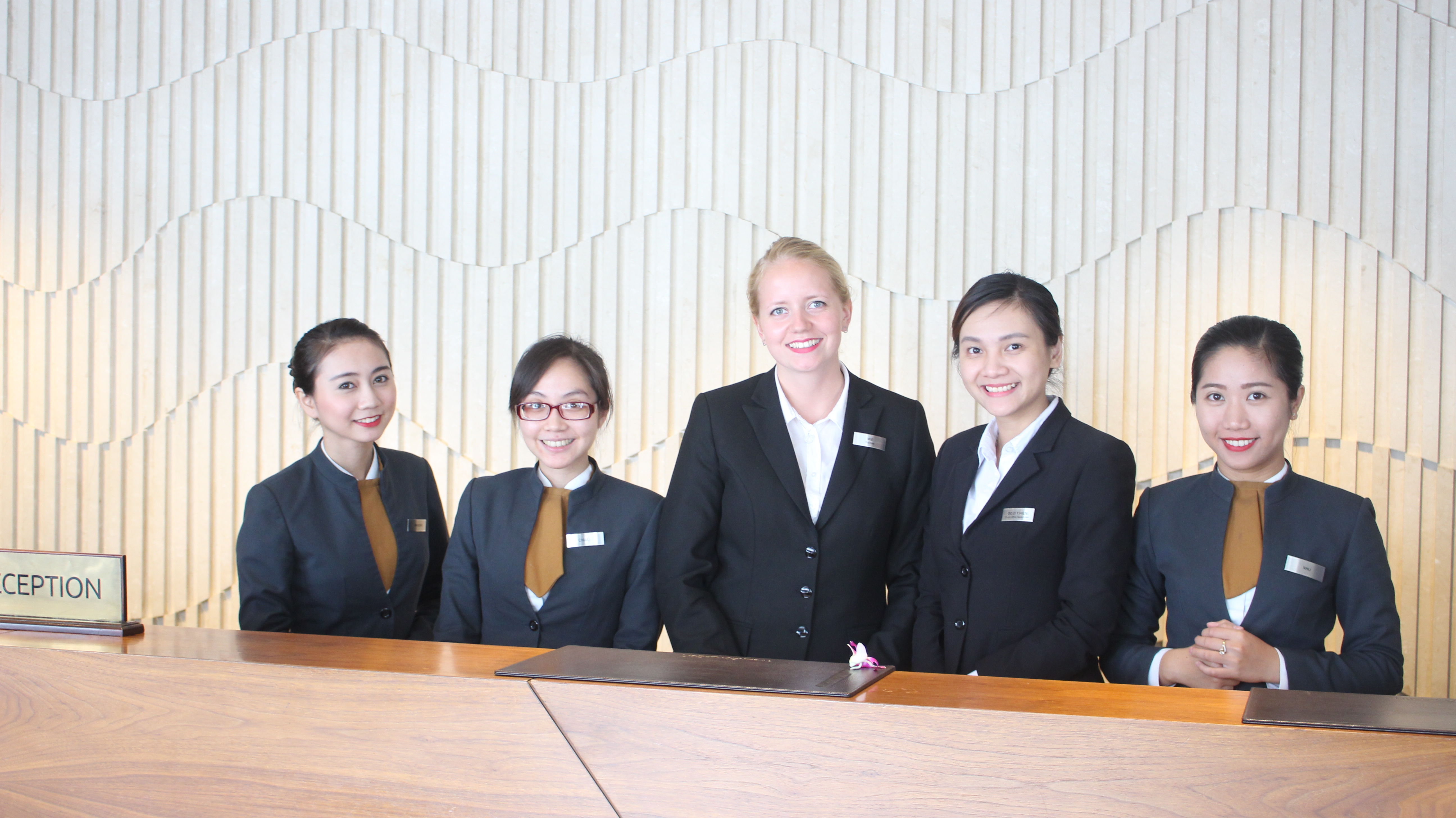Five workers of the reception during internship