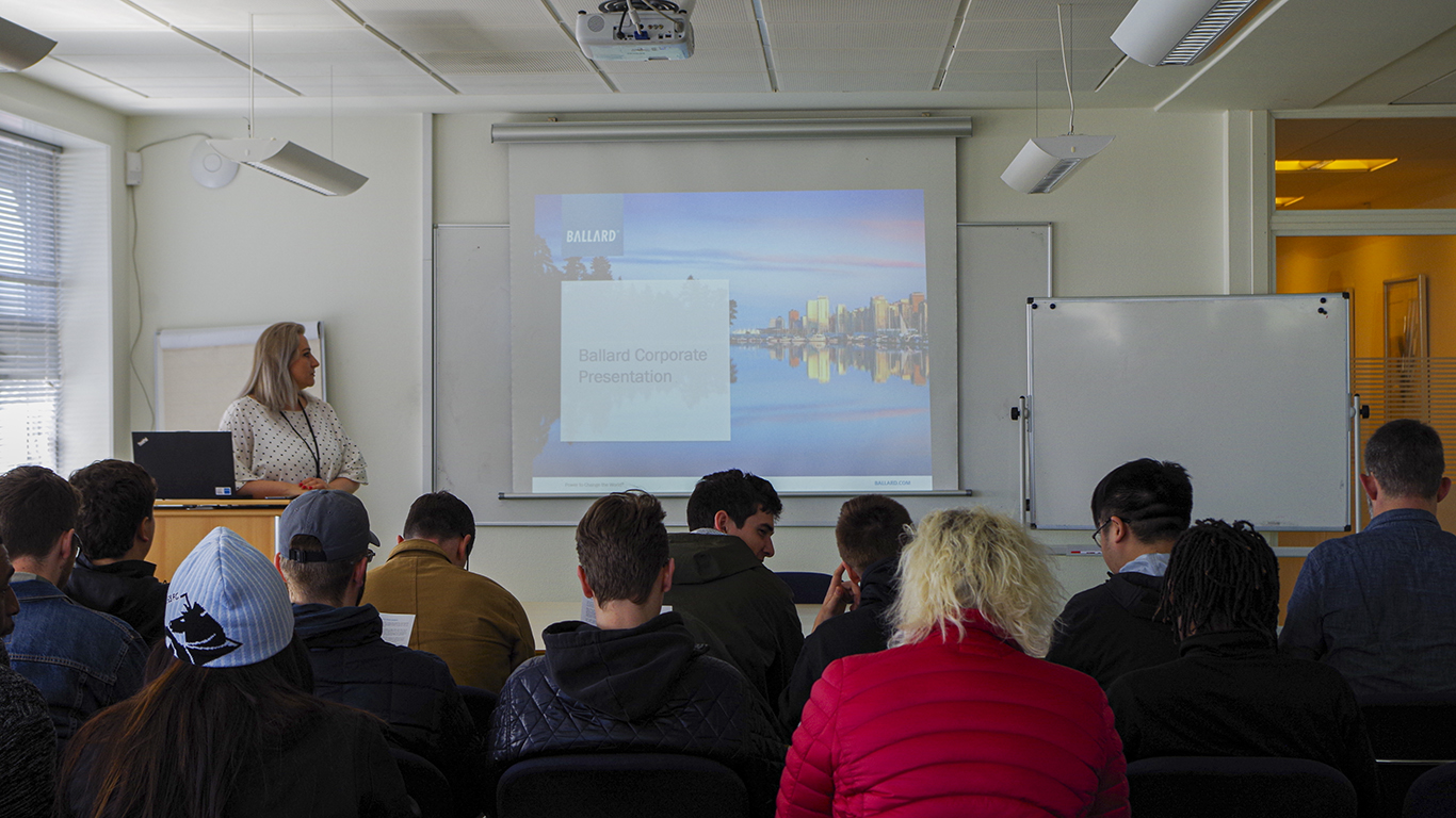 Group of student looking at blackboard and listening presentation