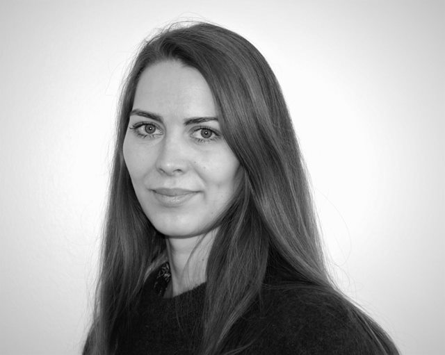 Black and white portrait of student with long hair