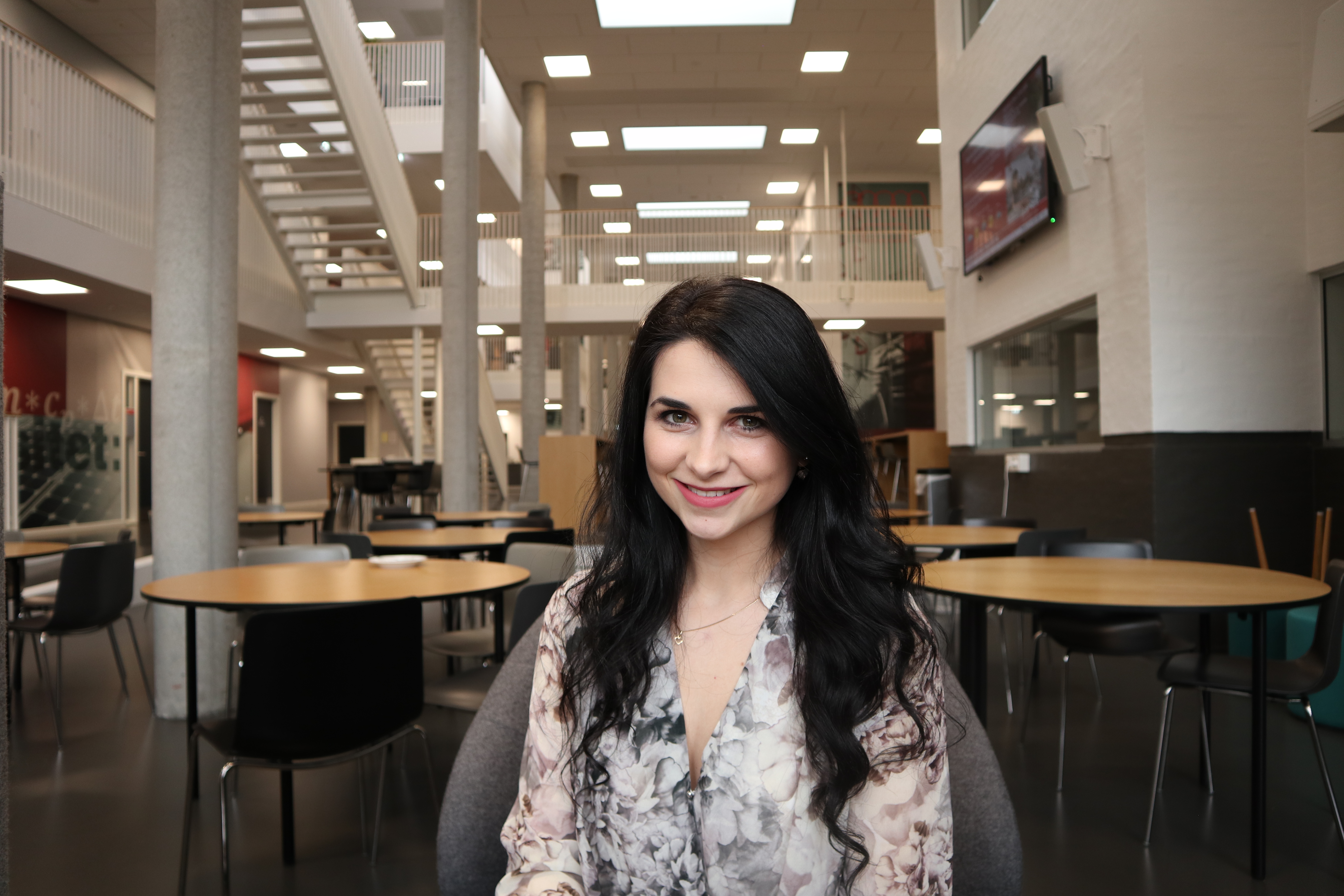 Women on the chair in the school canteen